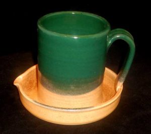 New Morning Gallery Green and Tan Ceramic Bacon Cookers by Stegall Pottery are made with food-safe ceramics and glazes.